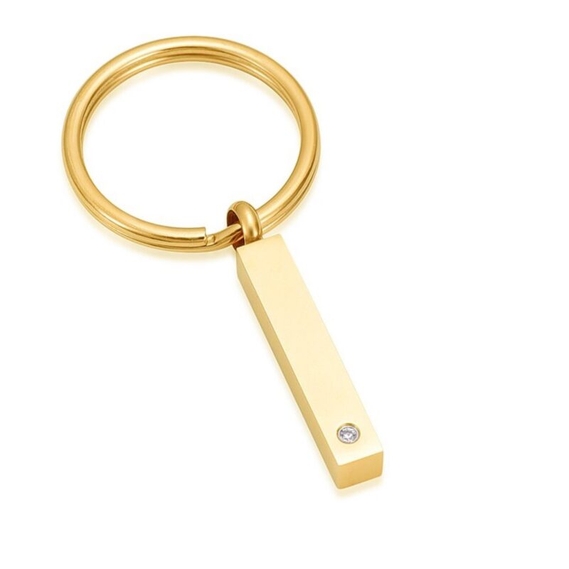 Sleutelhanger staafje met steentje - goud