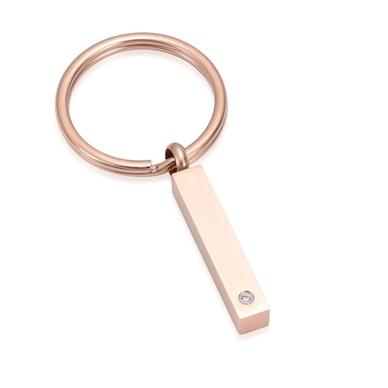 Sleutelhanger staafje met steentje - roségoud